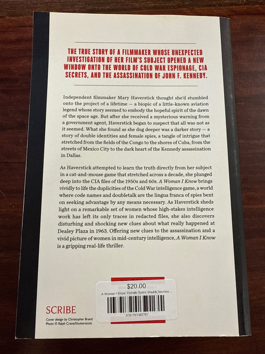 Back cover of 'A Woman I Know' by Mary Haverstick on a wooden surface