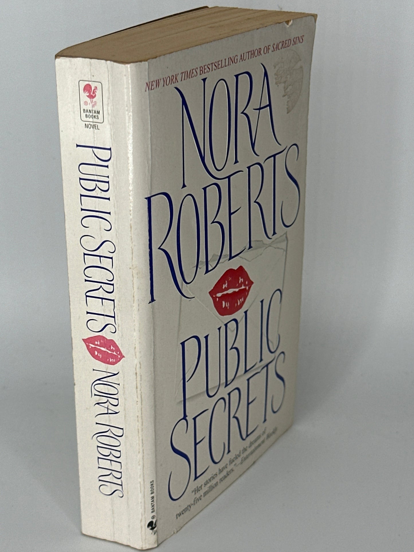 Nora Roberts Public Secrets: A Novel spine used books