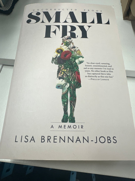 Book cover of 'Small Fry' by Lisa Brennan-Jobs on a white surface.