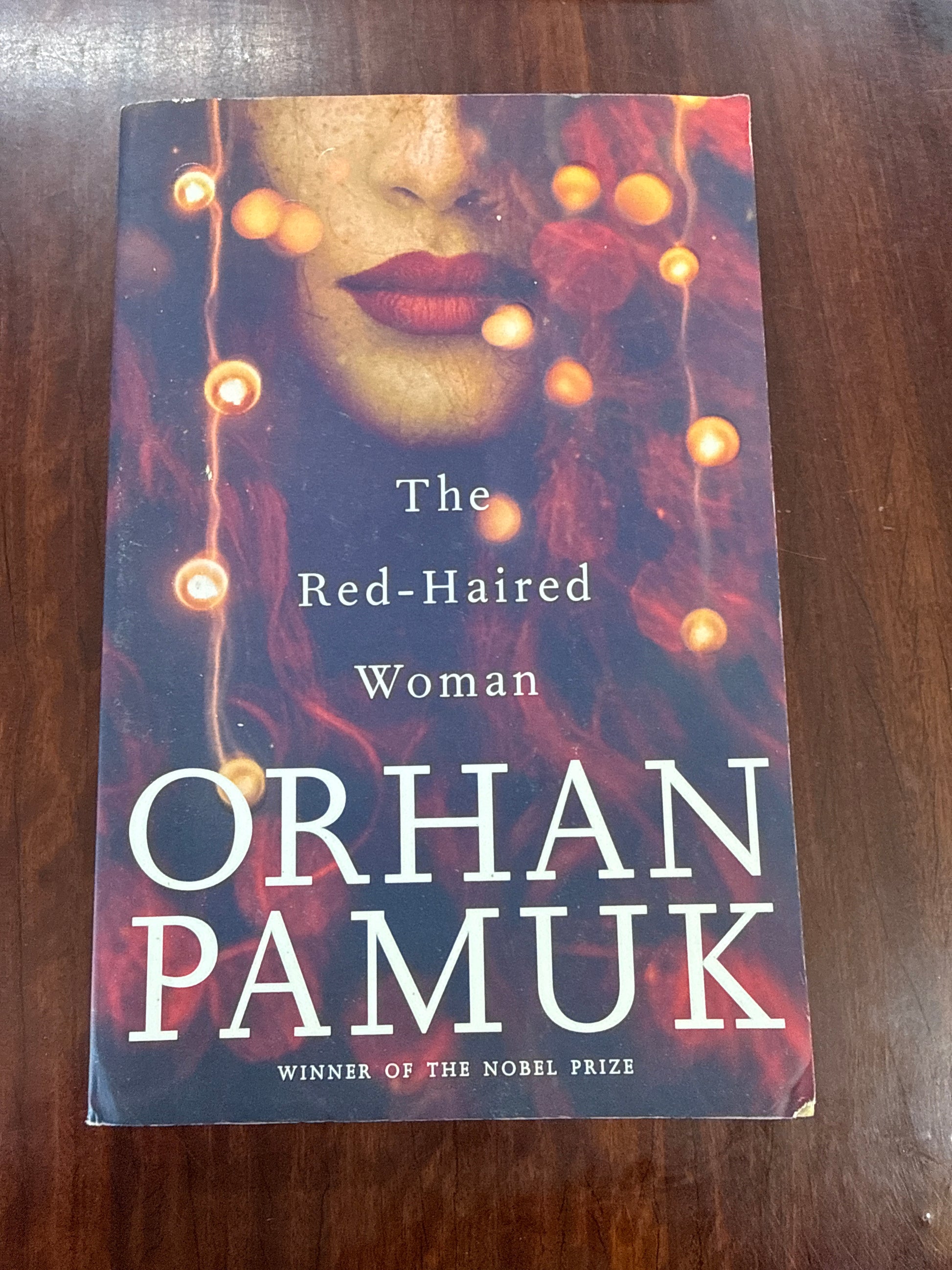 The Red-Haired Woman