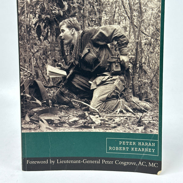 Book cover of 'Crossfire: An Australian Reconnaissance Unit in Vietnam' with a black and white photo of a soldier.