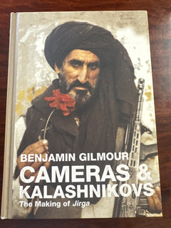 Cameras & Kalashnikovs: The making of Jirga (Signed Copy - Hardcover)