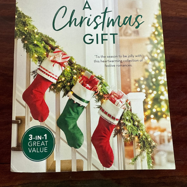 A Christmas Gift: The Snow Bride/The Road to Christmas/Hug Me, Holly!