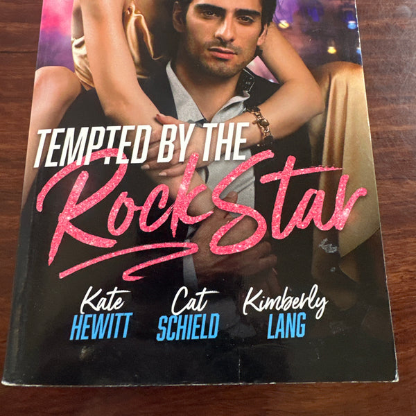 Tempted By The Rock Star: In the Heat of the Spotlight/Little Secret, Red Hot Scandal/The Downfall of a Good Girl