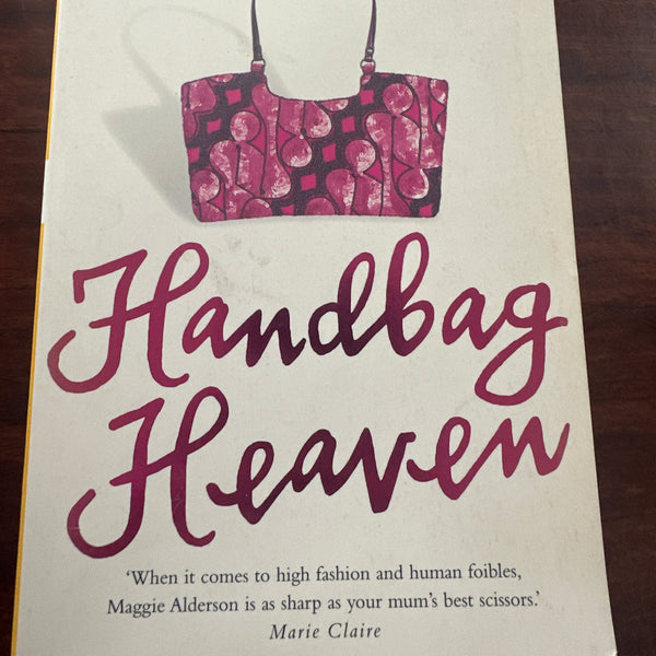 Book cover of 'Handbag Heaven' by Maggie Alderson with a pink handbag on a white background.