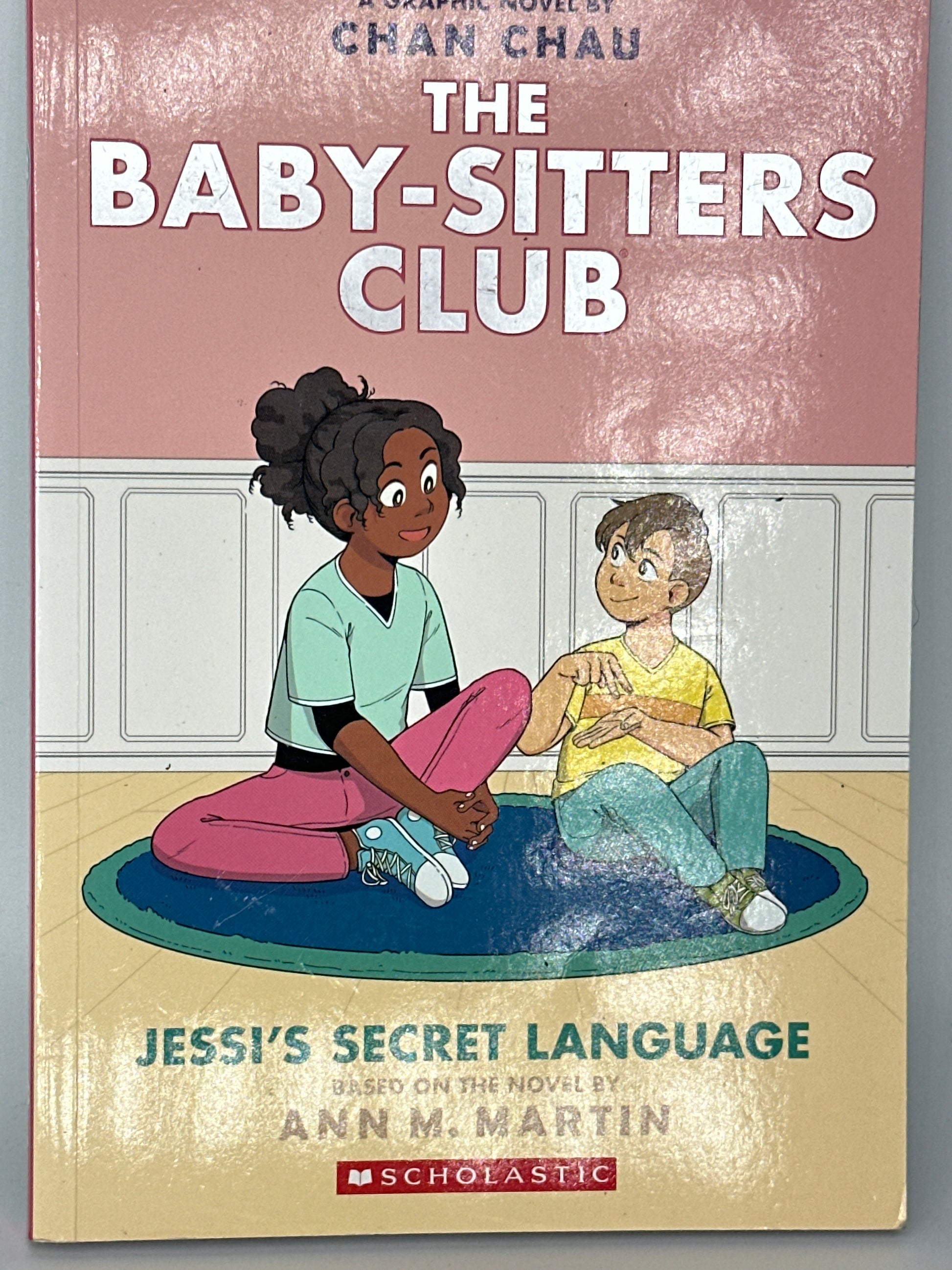 Jessi's Secret Language: A Graphic Novel (The Baby-Sitters Club #12) (The Baby-Sitters Club Graphix) front cover used books