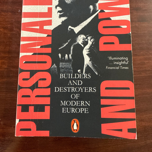 Book cover of 'Power and Personality' by Ian Kershaw on a wooden surface