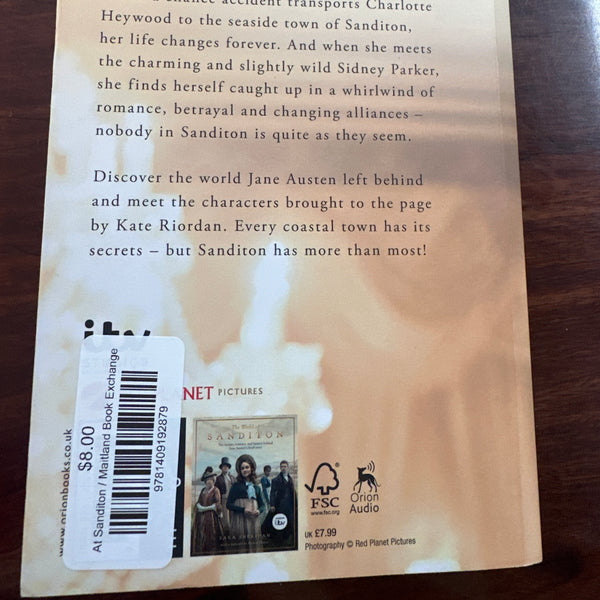 Back Book cover of 'Sanditon' by Kate Riordan on a wooden surface