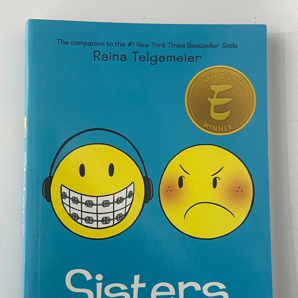 Raina Telgemeier Sisters: A Graphic Novel front cover used books