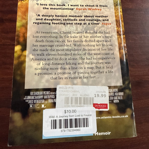 Back cover of Book titled 'Wild' by Cheryl Strayed on a wooden surface